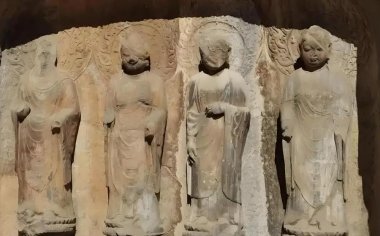 龙门石窟为什么大多数没有佛头？探寻历史的伤痕